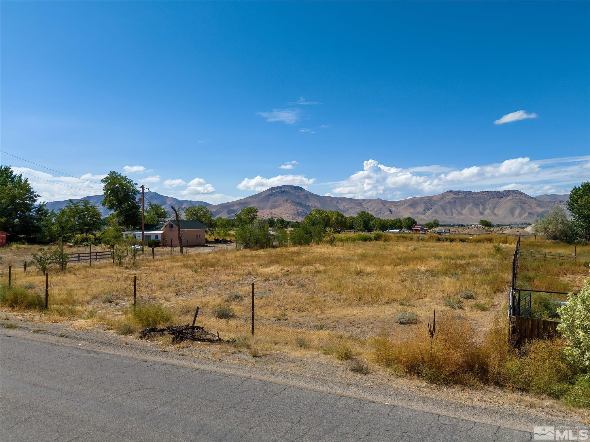 Mac MacKenzie Lane Yerington, NV 89447 - Photo 20 of 24 a view of a lake with a mountain