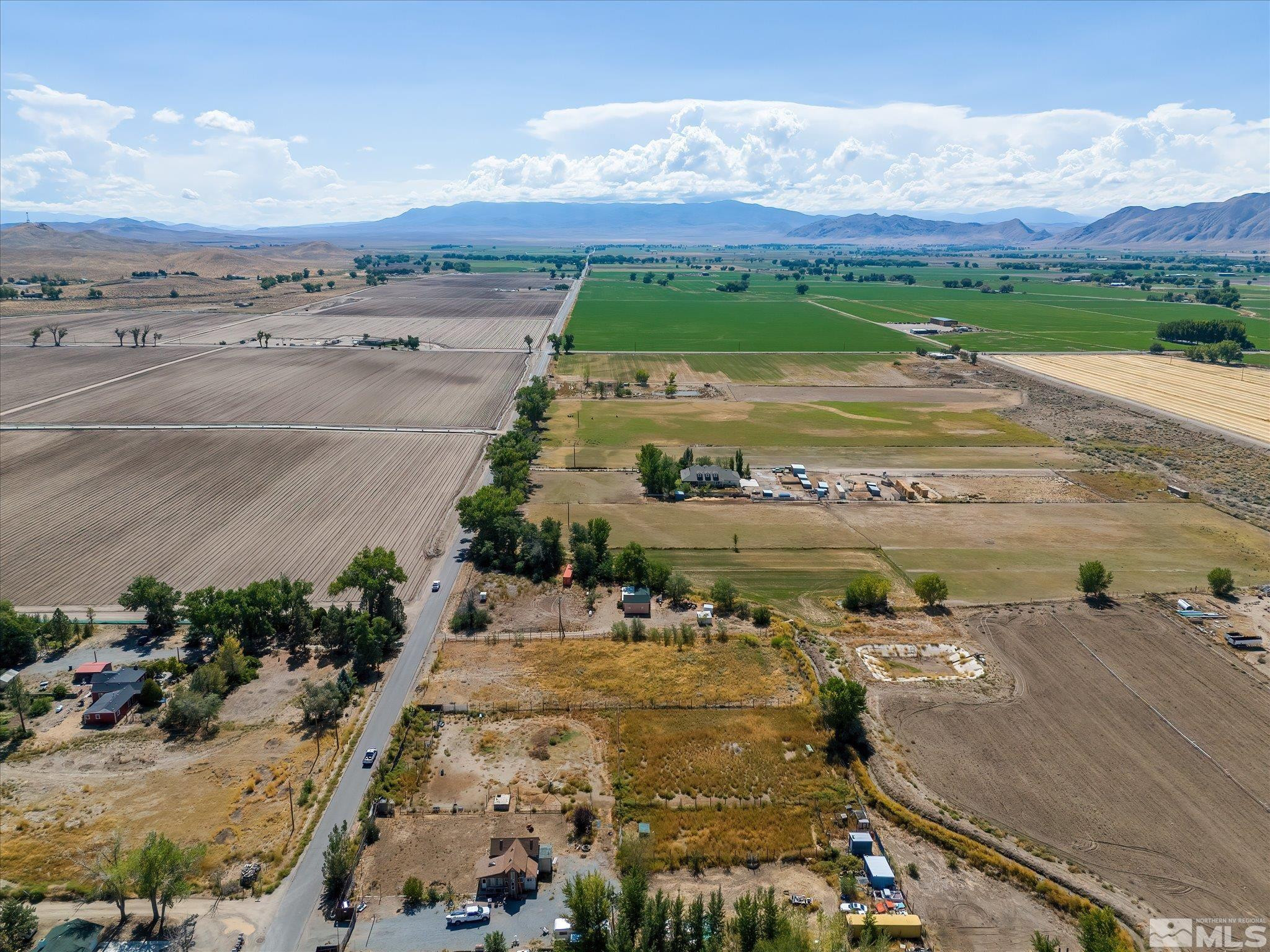 Mac MacKenzie Lane Yerington, NV 89447 - Photo 8 of 24 an aerial view of a house with a yard