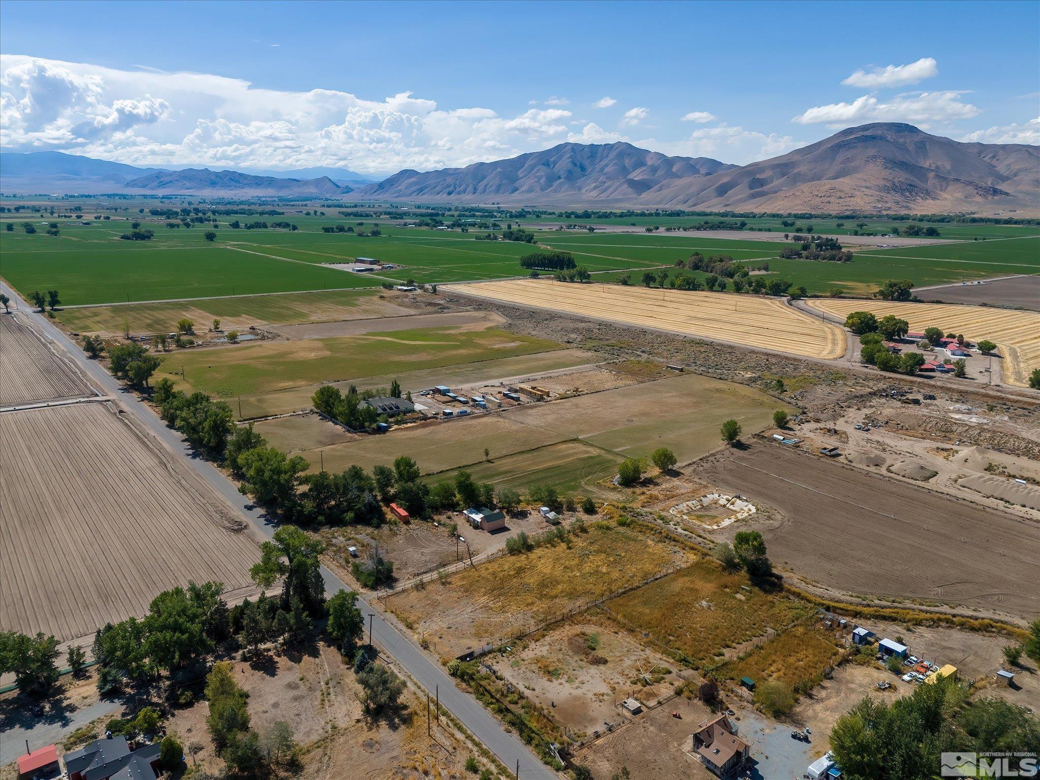 Mac MacKenzie Lane Yerington, NV 89447 - Photo 9 of 24 an aerial view of a house with a garden