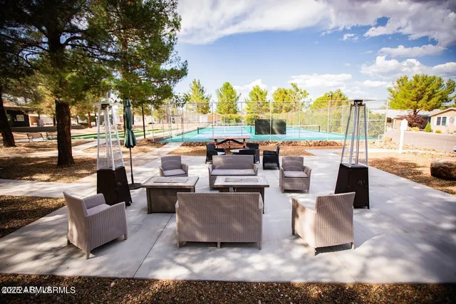 a view of a livingroom with furniture and wooden floor