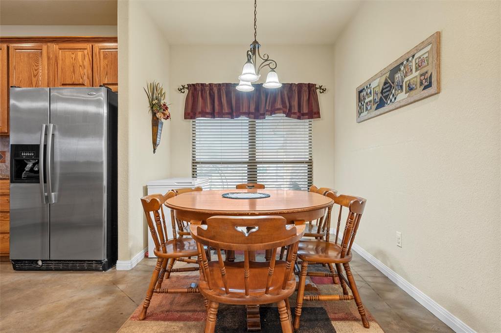 900 Elizabeth Drive Robinson, TX 76706 - Photo 12 of 35 a view of a dining room with furniture