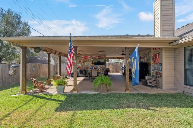 a view of a porch and a yard