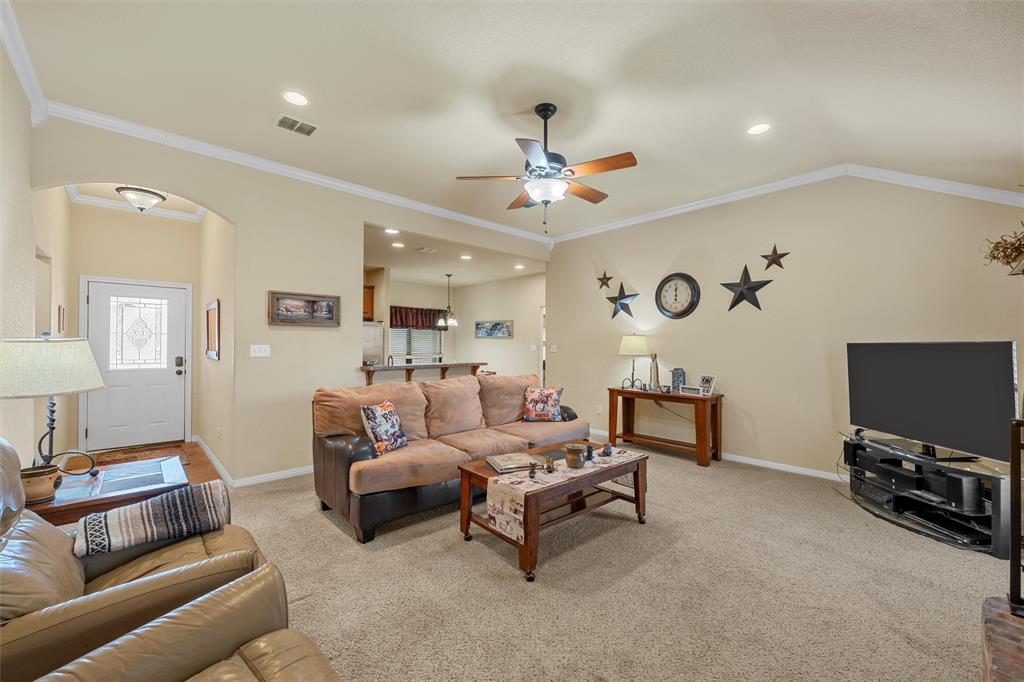 900 Elizabeth Drive Robinson, TX 76706 - Photo 7 of 35 a living room with furniture and a flat screen tv
