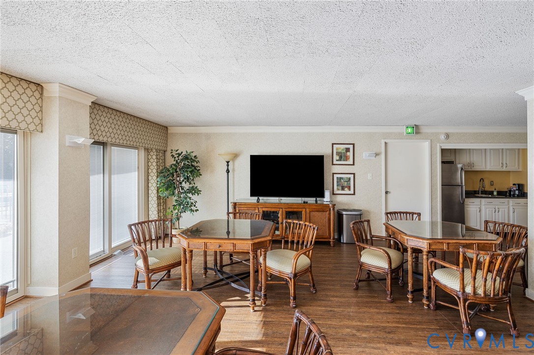 2956 Hathaway Road, Unit U104 Richmond, VA 23225 - Photo 31 of 42 a view of a livingroom with furniture and a flat screen tv