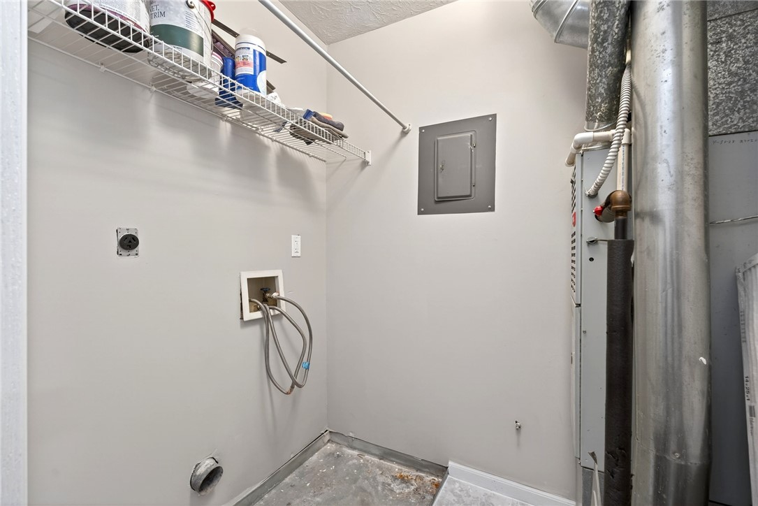 3151 Roesch Boulevard, Unit 6 Fairfield, OH 45014 - Photo 22 of 29 This dedicated laundry space offers convenience and essential connections for your home.
