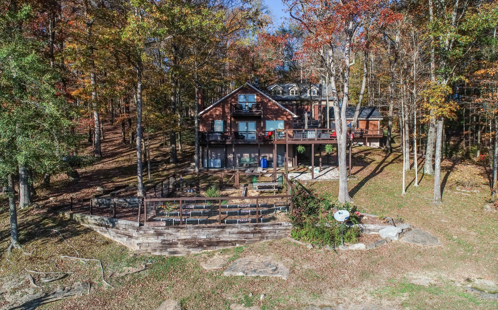 8898 Faix Road Byrdstown, TN 38549 - Photo 45 of 45 a wooden bench sitting in front of a house