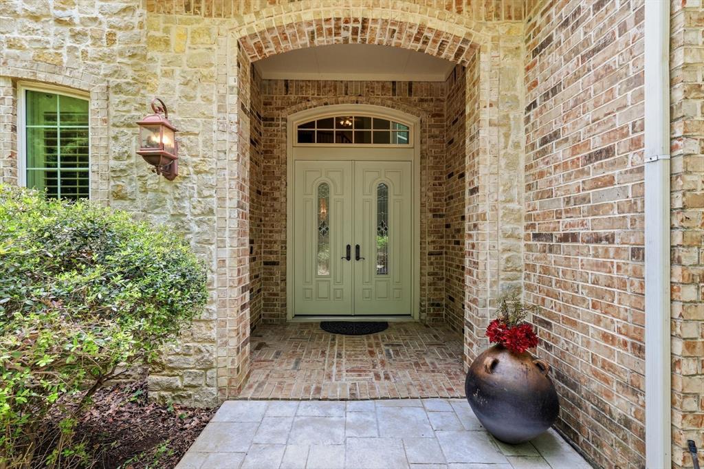 970 Crystal Cove Oak Point, TX 75068 - Photo 3 of 40 a view of a entryway door of the house