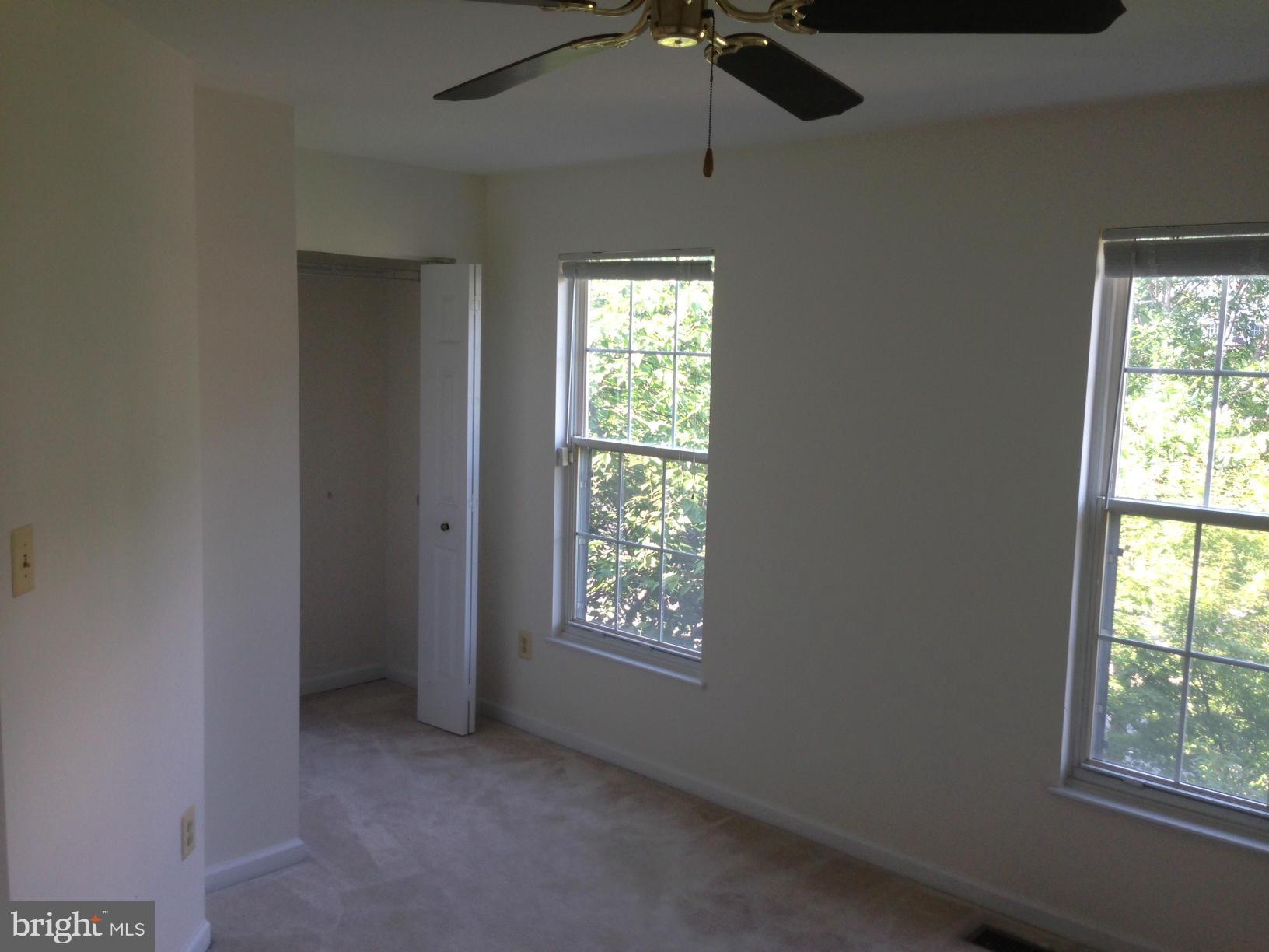 2180 South Glebe Road Arlington, VA 22204 - Photo 12 of 19 a view of an empty room with a window