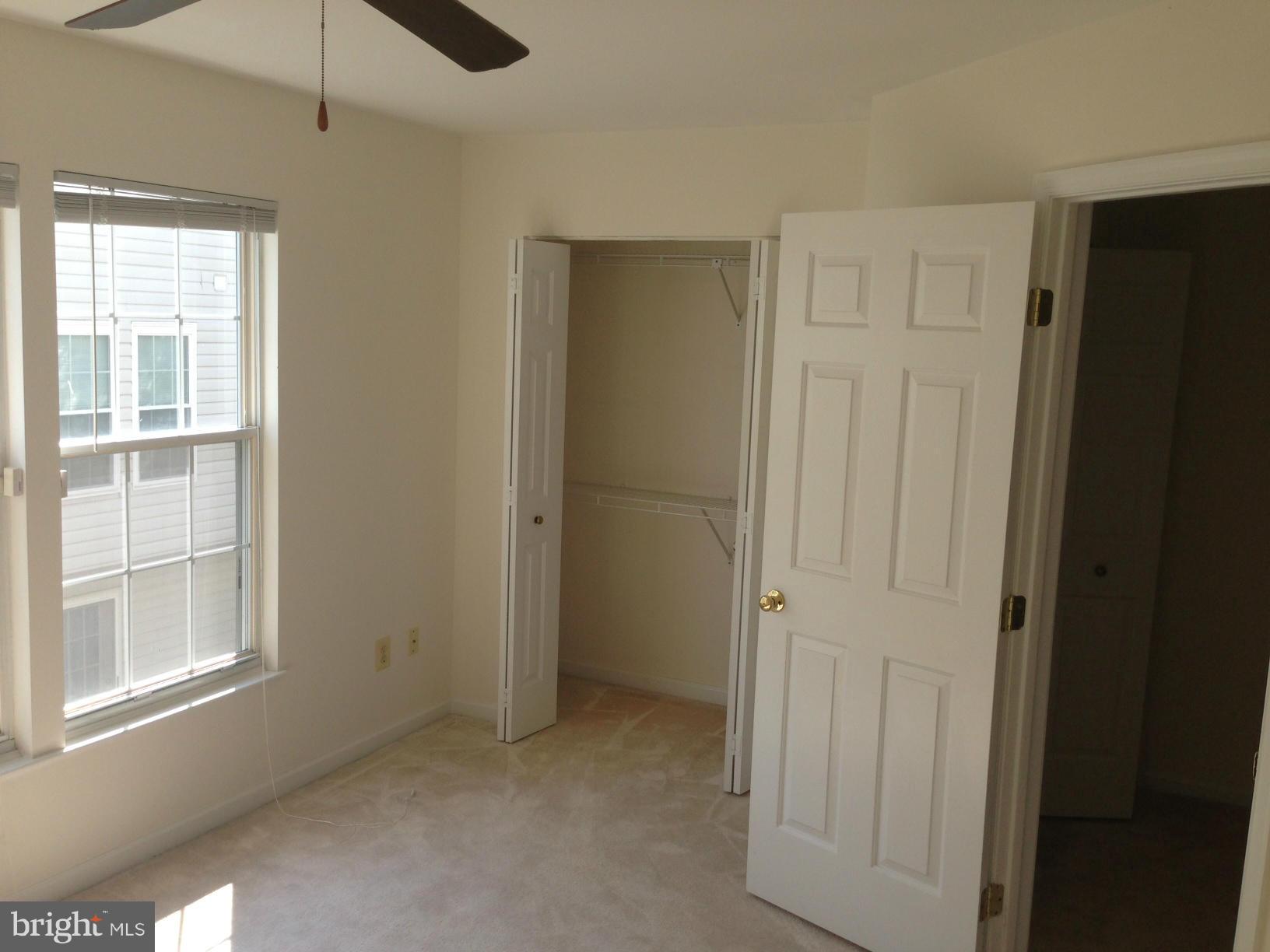2180 South Glebe Road Arlington, VA 22204 - Photo 15 of 19 an empty room with windows