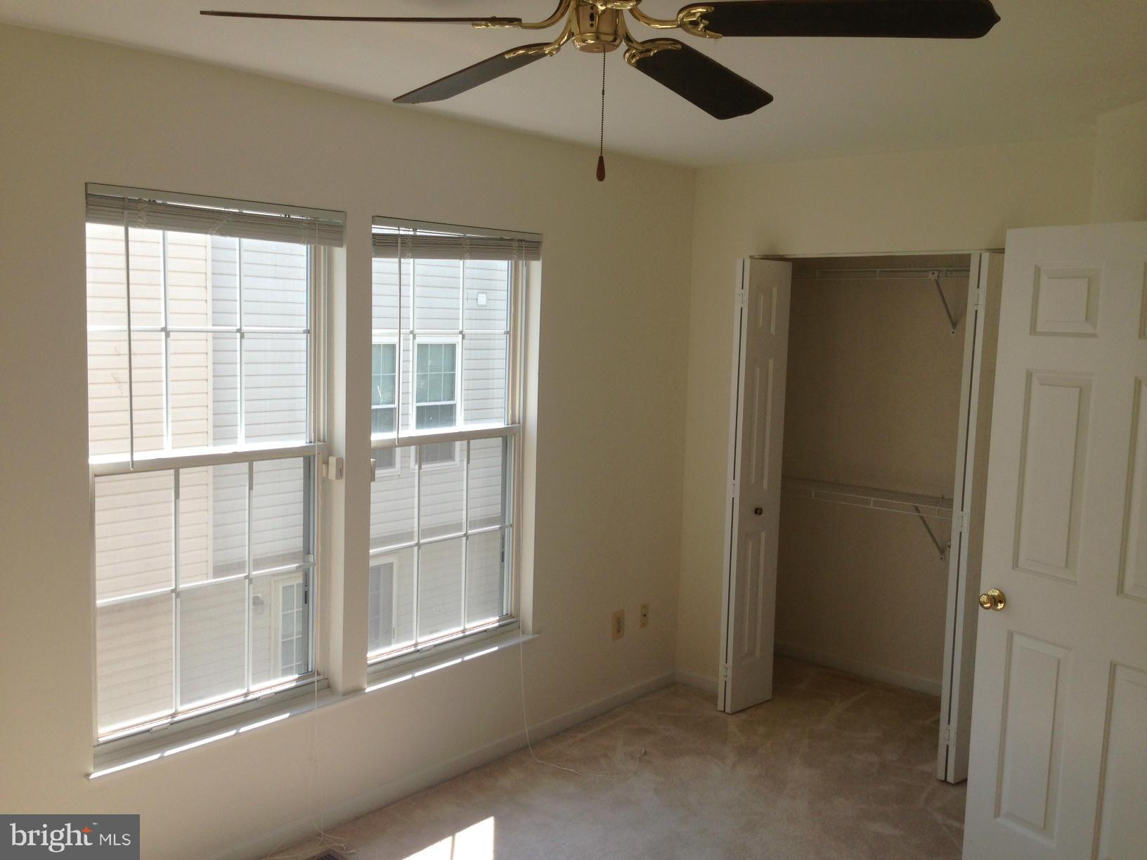 2180 South Glebe Road Arlington, VA 22204 - Photo 16 of 19 a view of an empty room with a window