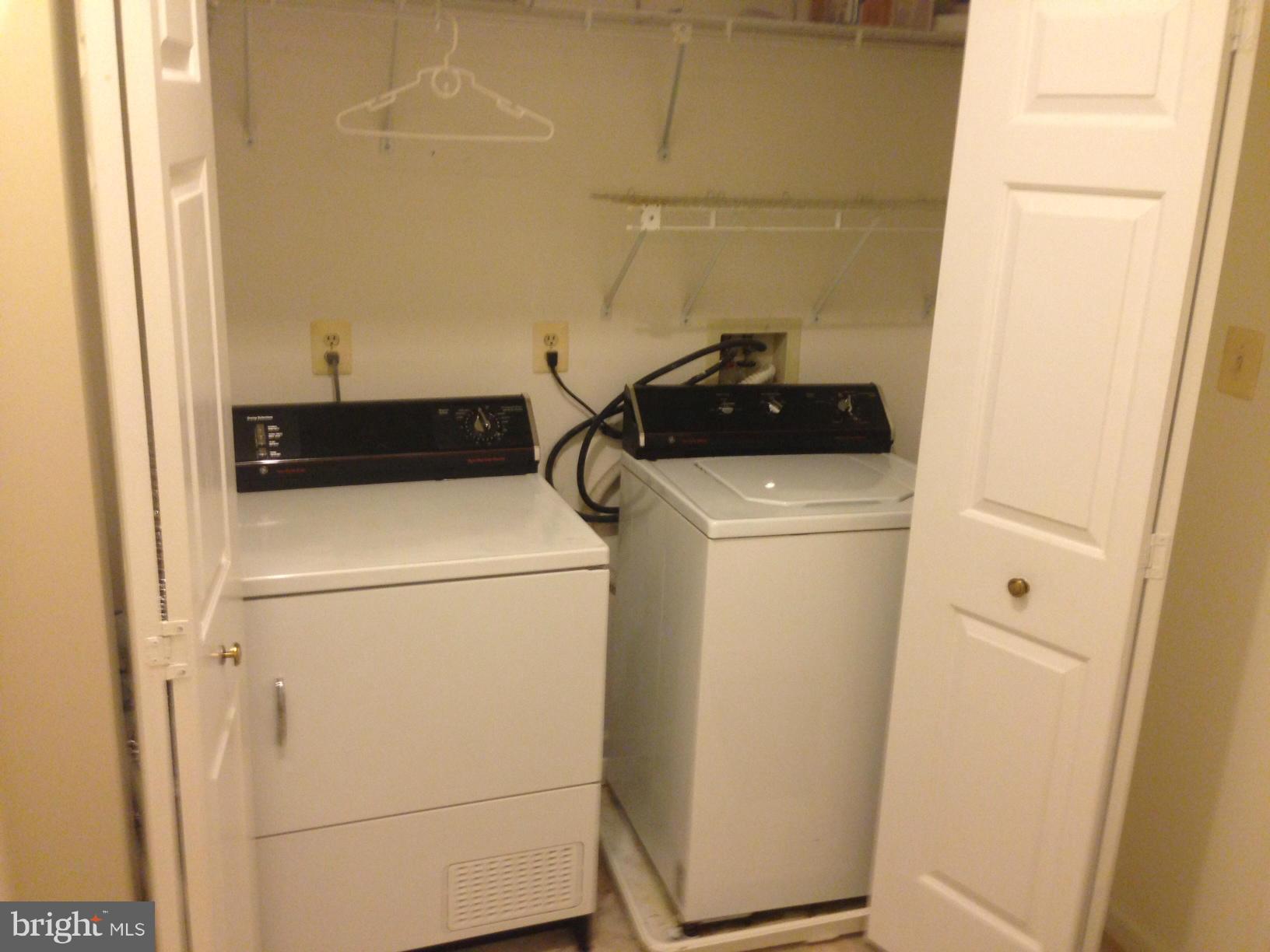 2180 South Glebe Road Arlington, VA 22204 - Photo 17 of 19 a utility room with dryer and washer