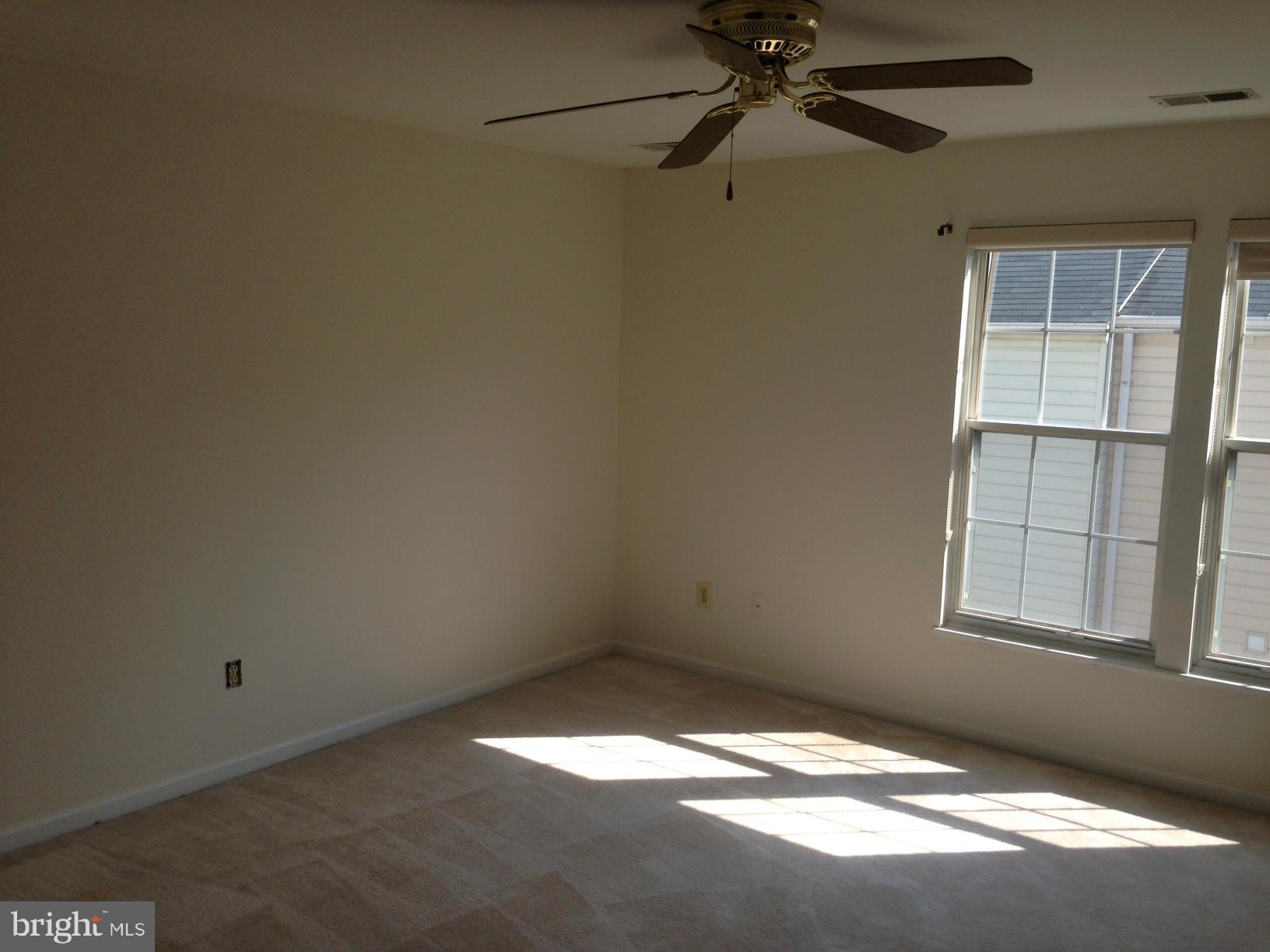 2180 South Glebe Road Arlington, VA 22204 - Photo 9 of 19 a view of empty room with windows