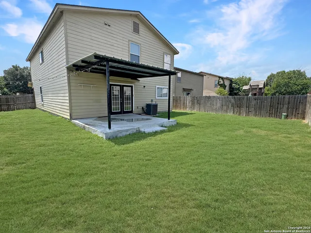 a house view with a outdoor space