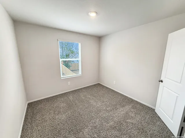 a view of a kitchen with a sink