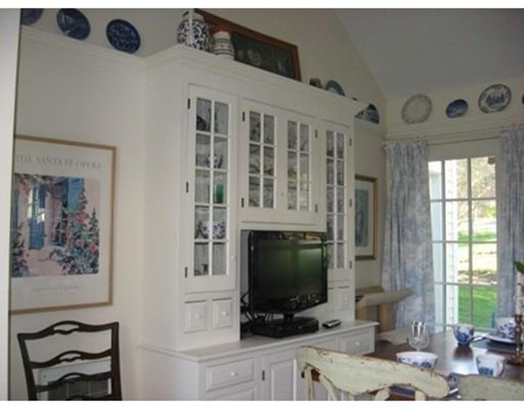 6 McGregory Road Sturbridge, MA 01566 - Photo 7 of 27 a living room with furniture and a flat screen tv