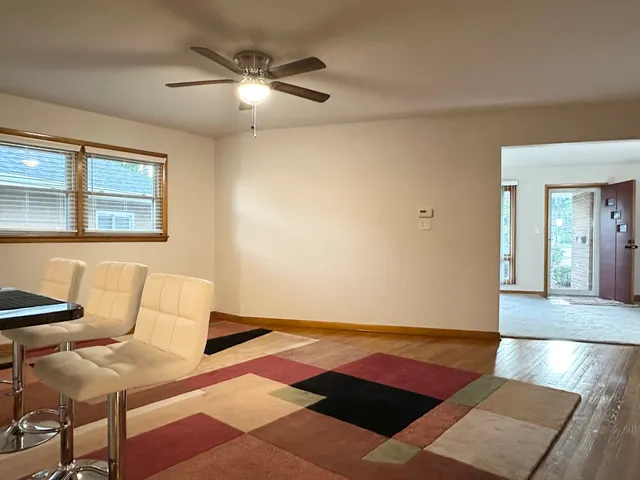 a stove top oven sitting inside of a kitchen