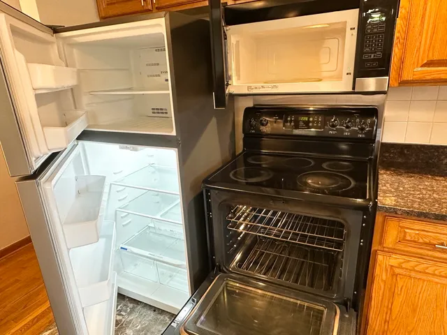 a bathroom with a shower and a sink
