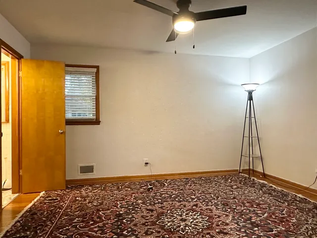 a utility room with cabinets