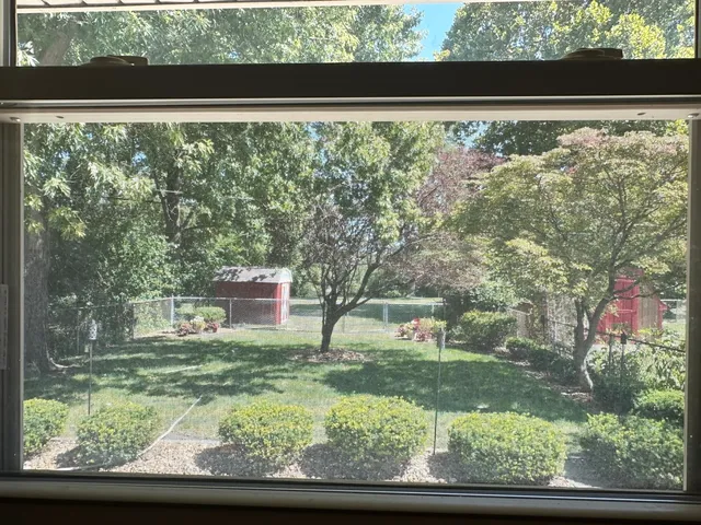 a view of entryway and hall way with furniture