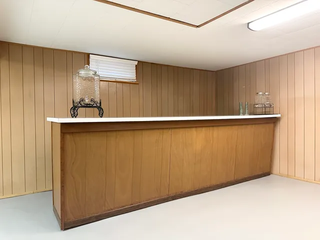 a backyard of a house with seating space