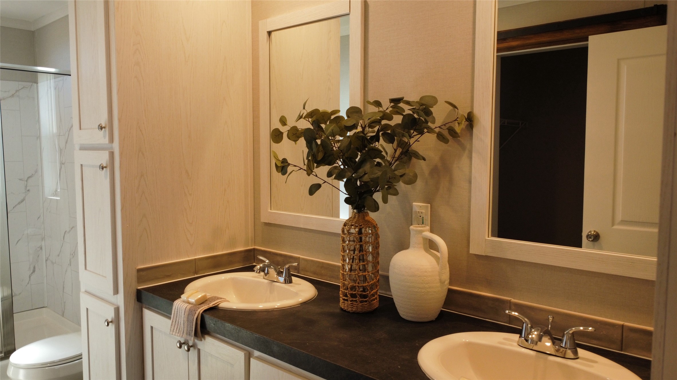 147 Ardales Drive Elgin, TX 78621 - Photo 10 of 14 Bathroom featuring double vanity and a marble finish shower