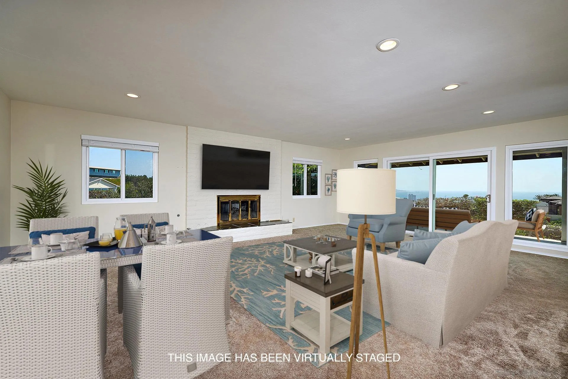5560 Moonlight Lane La Jolla, CA 92037 - Photo 17 of 48 a living room with fireplace furniture and a flat screen tv