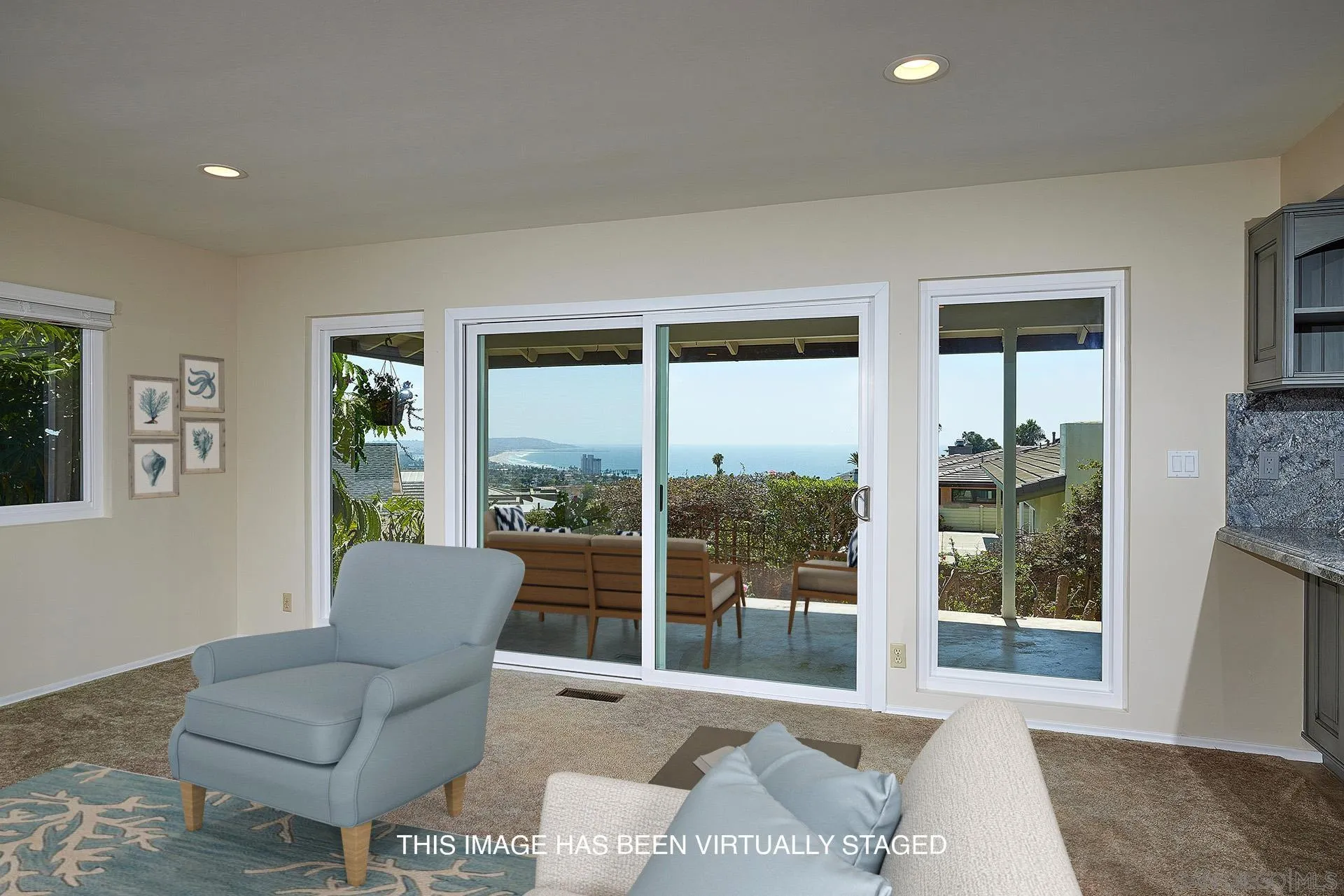 5560 Moonlight Lane La Jolla, CA 92037 - Photo 18 of 48 a living room with furniture and a large window