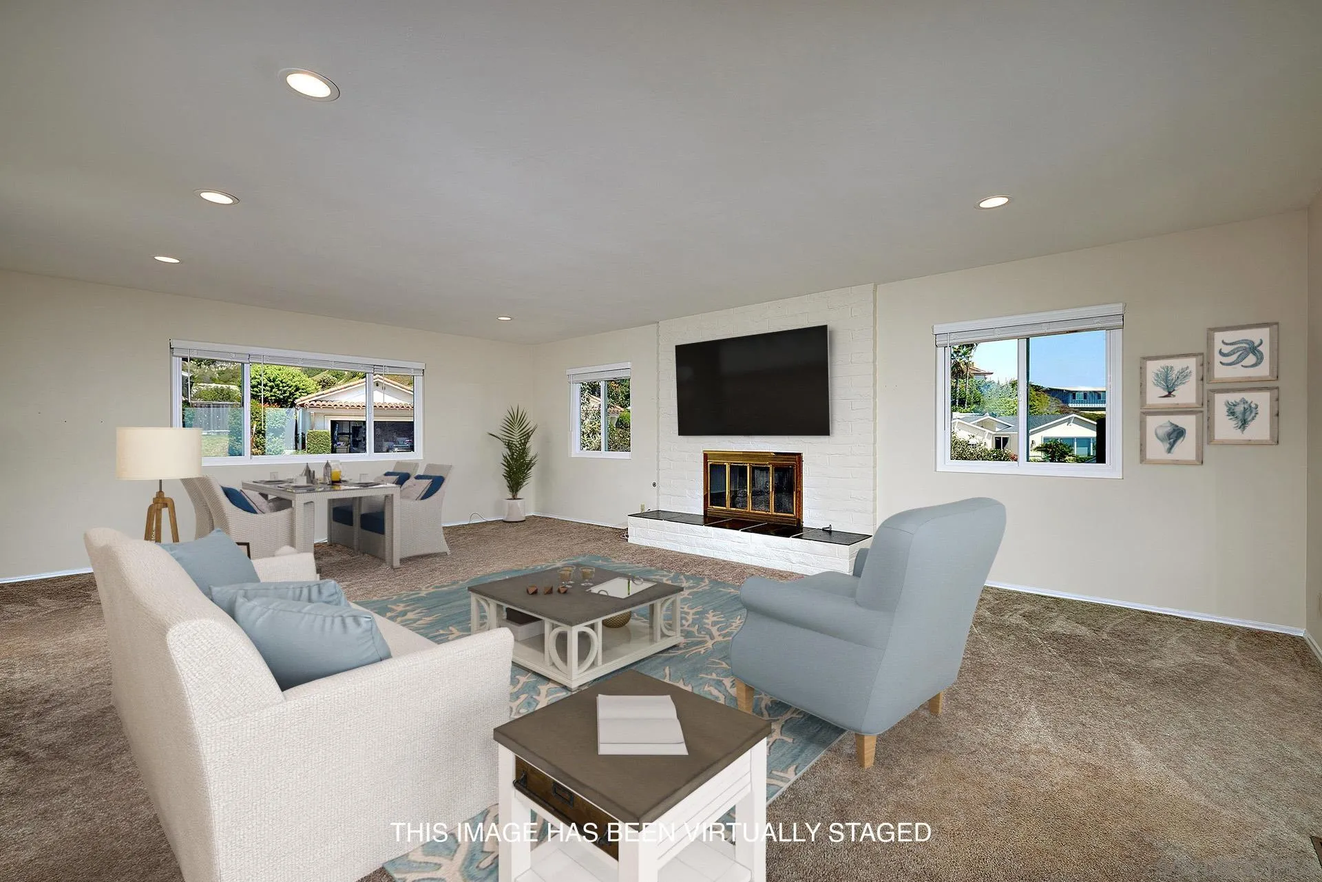 5560 Moonlight Lane La Jolla, CA 92037 - Photo 20 of 48 a living room with furniture a rug and a flat screen tv
