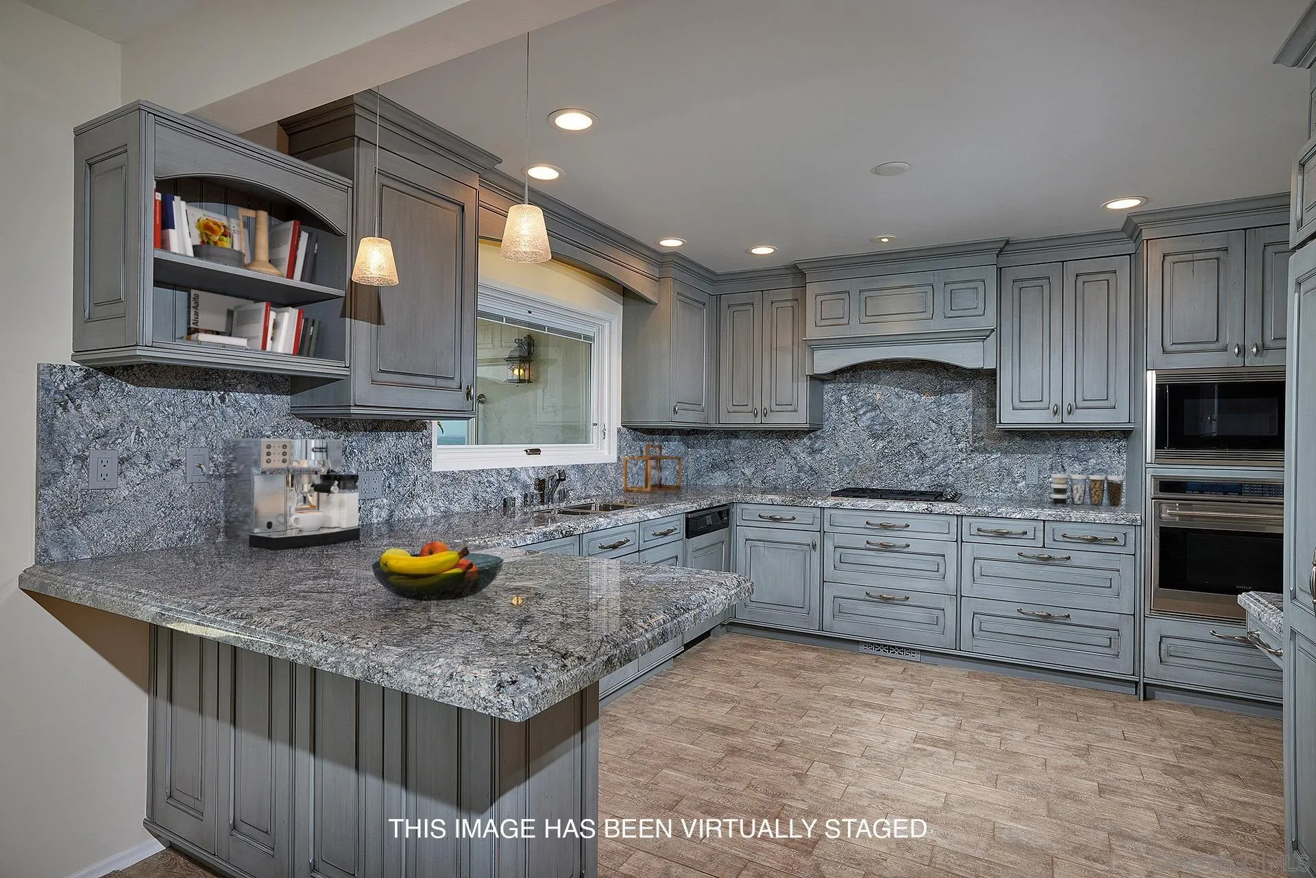 5560 Moonlight Lane La Jolla, CA 92037 - Photo 22 of 48 a kitchen with a sink a stove and cabinets