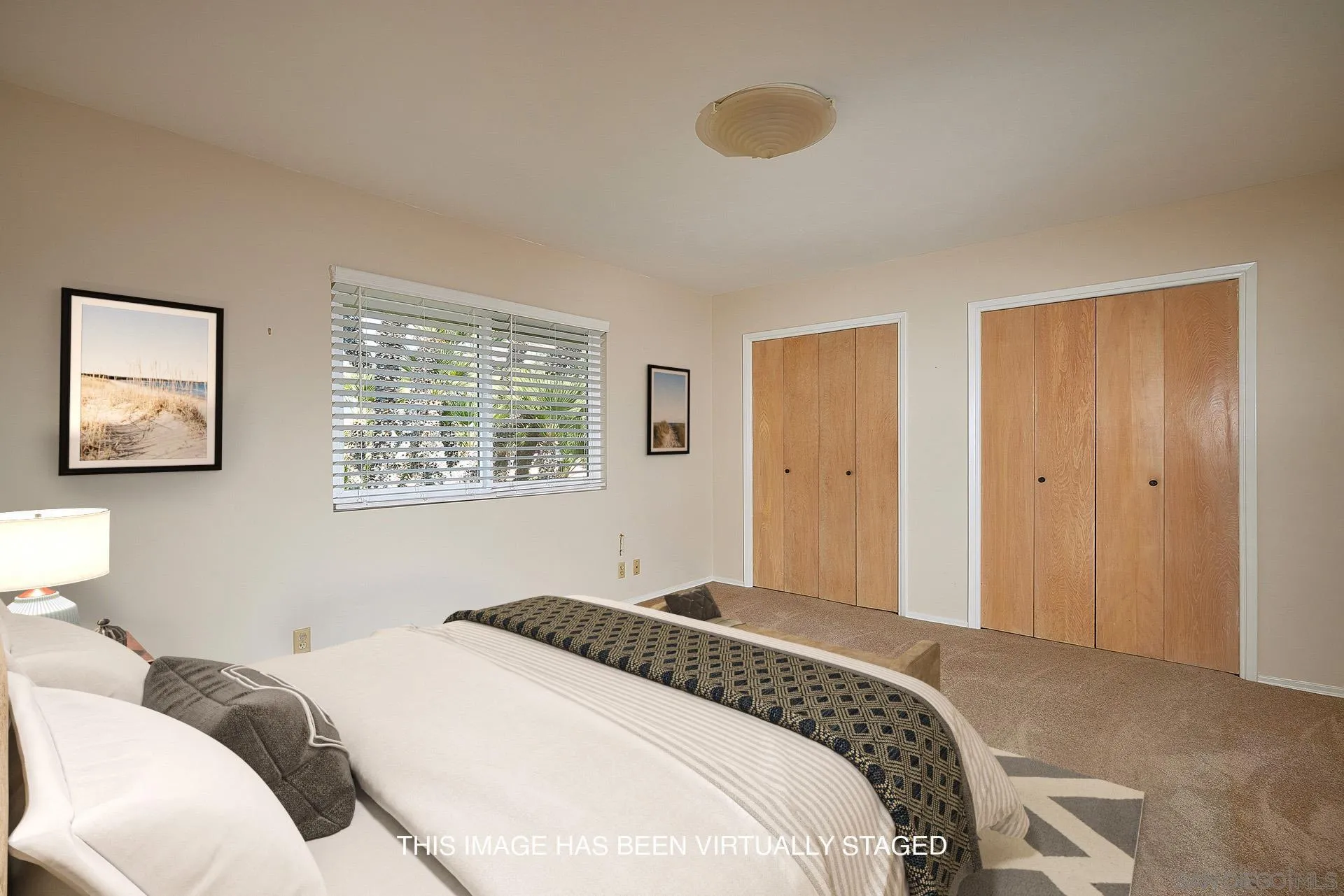 5560 Moonlight Lane La Jolla, CA 92037 - Photo 26 of 48 a bedroom with a bed and a window