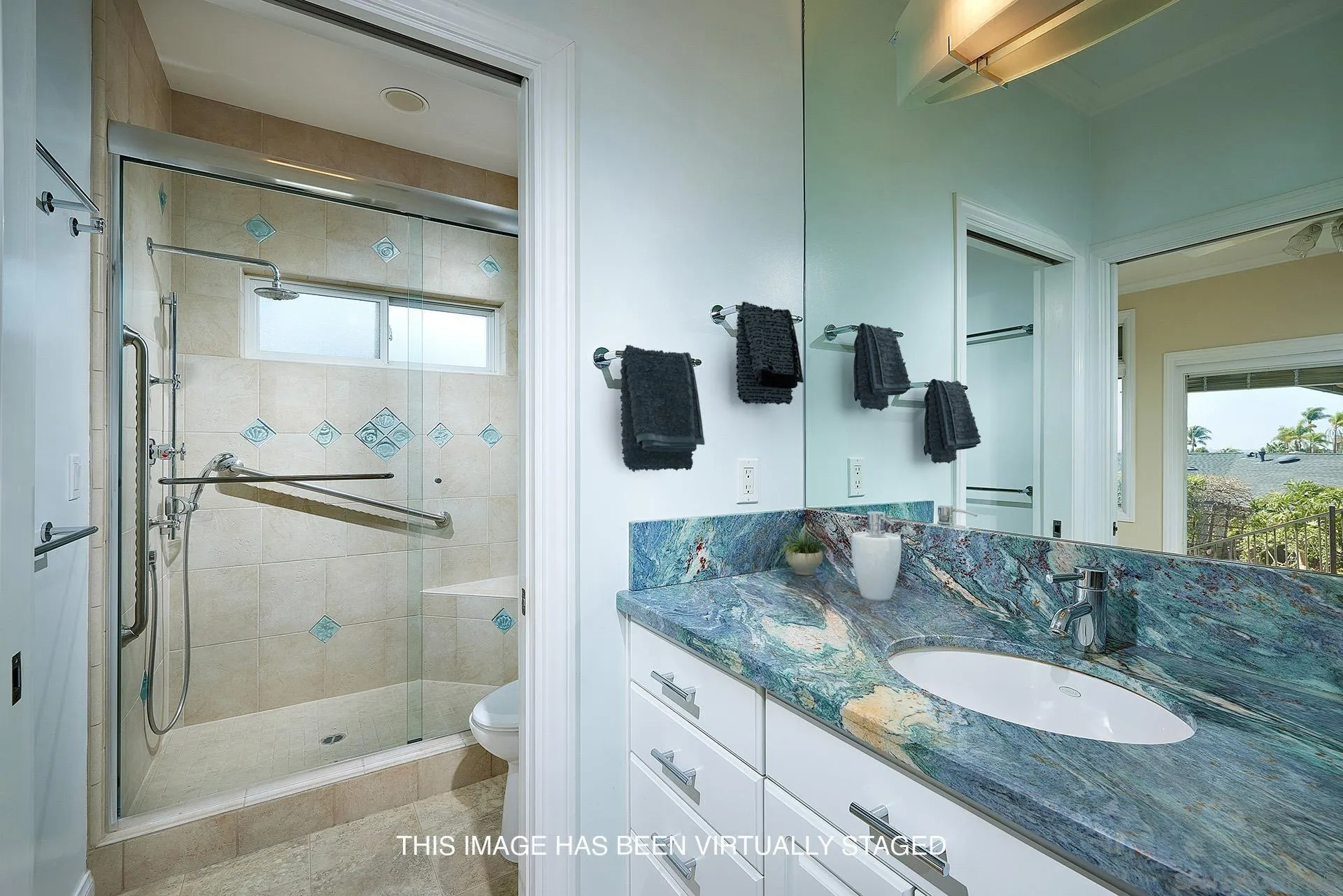 5560 Moonlight Lane La Jolla, CA 92037 - Photo 30 of 48 a bathroom with a granite countertop sink and a mirror