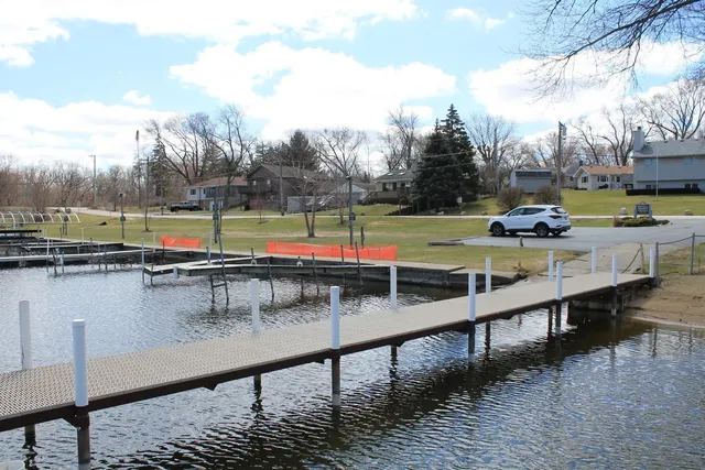 a view of swimming pool with an outdoor seating