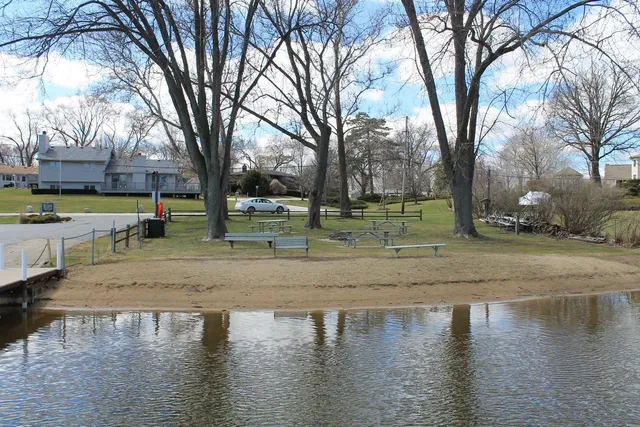 a view of a lake with a house
