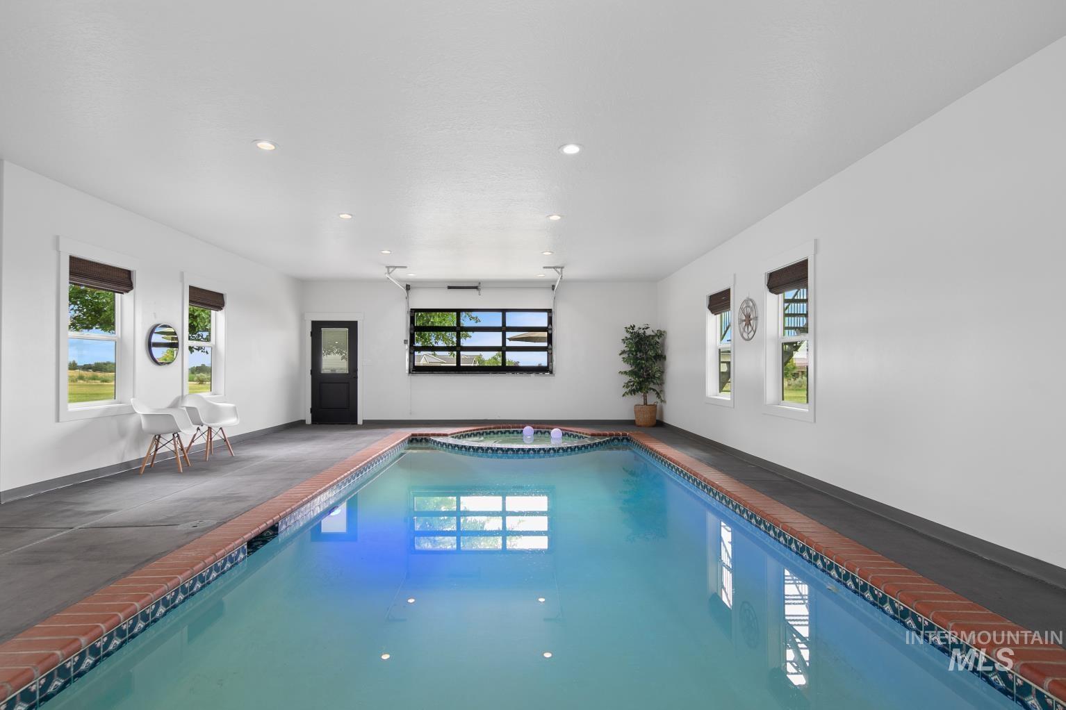 8365 Rustin Road Middleton, ID 83644 - Photo 25 of 48 View of the indoor pool with connected hot tub