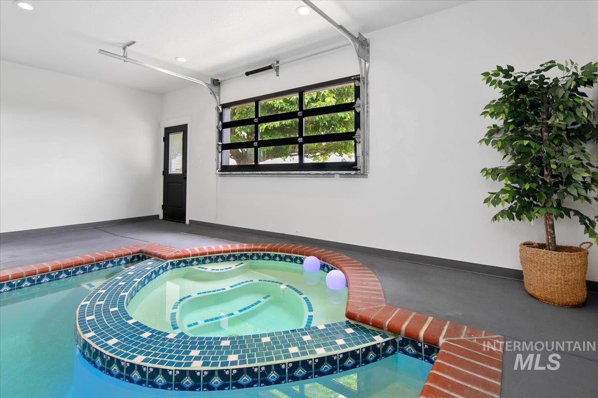 8365 Rustin Road Middleton, ID 83644 - Photo 26 of 48 View of pool with an in-ground hot tub