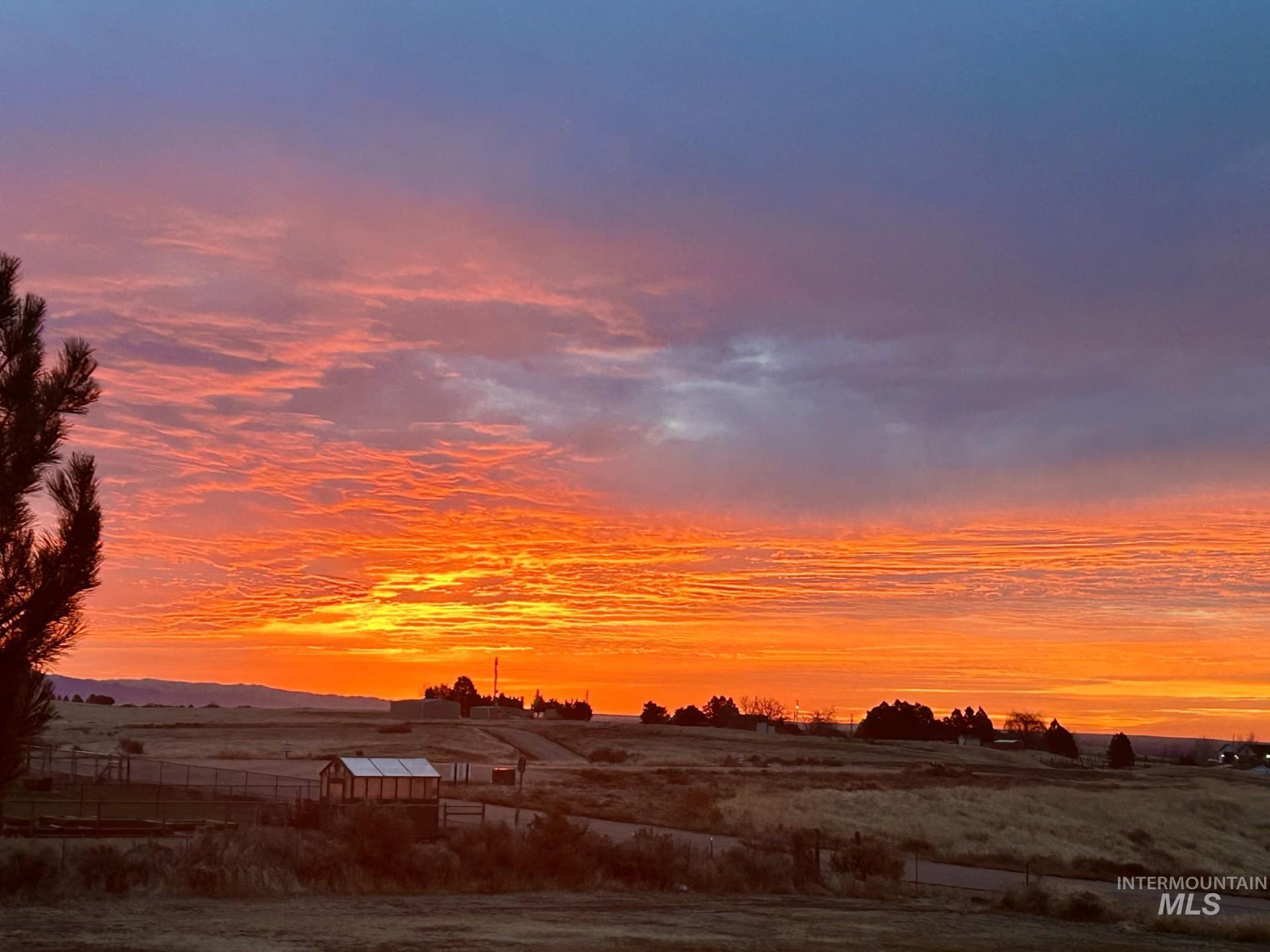8365 Rustin Road Middleton, ID 83644 - Photo 45 of 48 Sunset view from the home with rural landscape