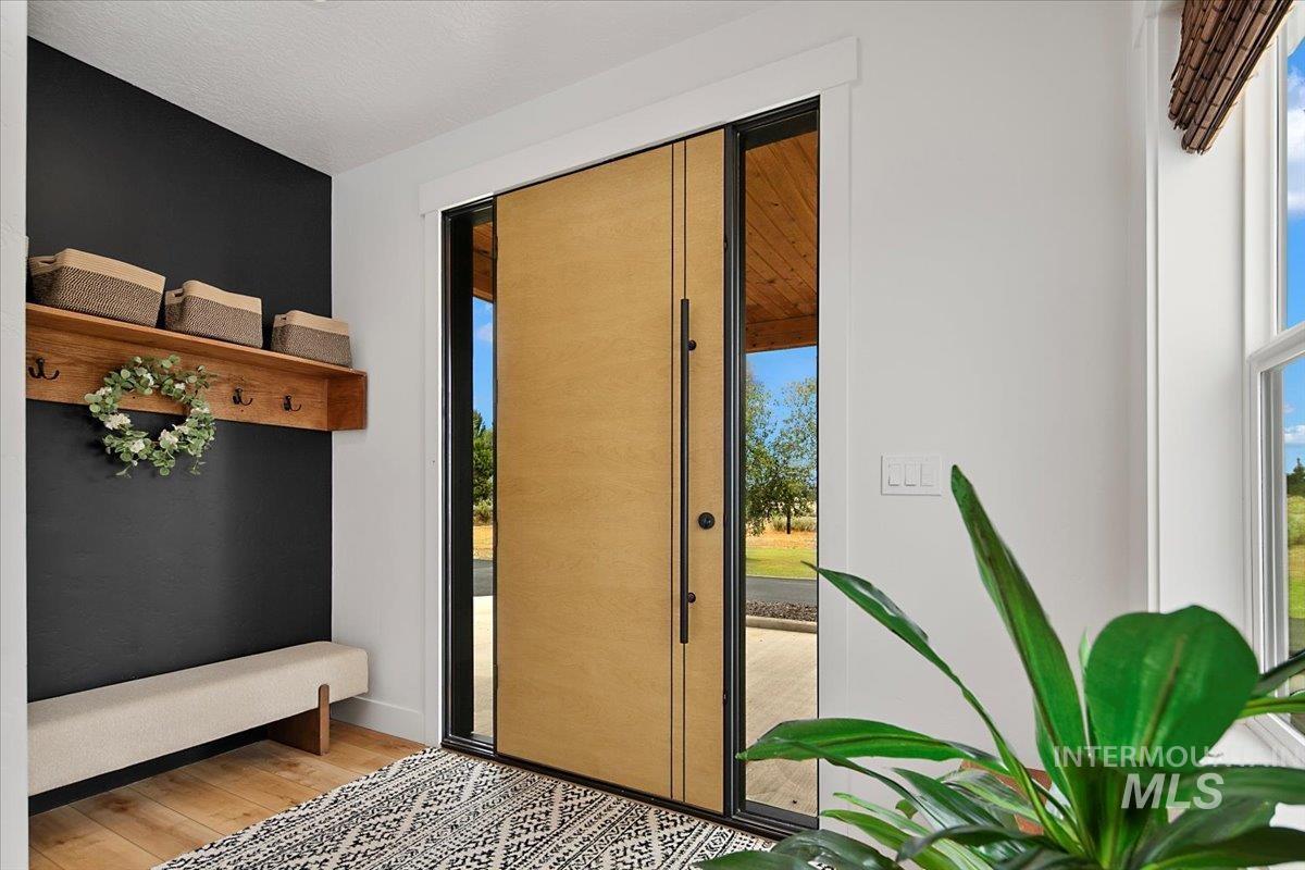8365 Rustin Road Middleton, ID 83644 - Photo 3 of 48 Doorway featuring light wood-type flooring and plenty of natural light
