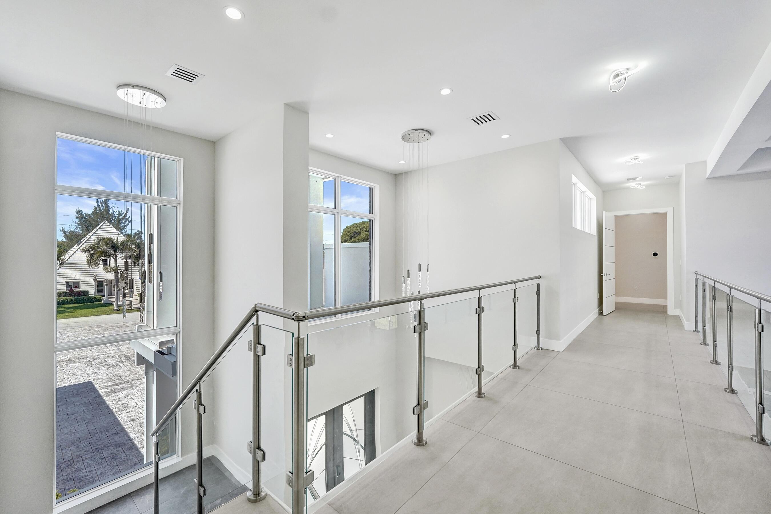 11201 Southwest 3rd Street Plantation, FL 33325 - Photo 41 of 79 Upstairs walkway