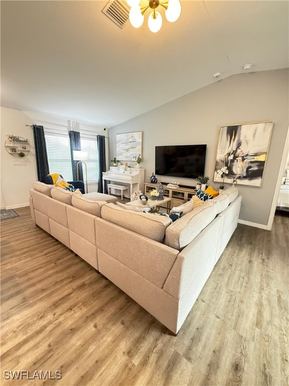 3006 Base Court LaBelle, FL 33935 - Photo 3 of 19 a living room with furniture and a flat screen tv