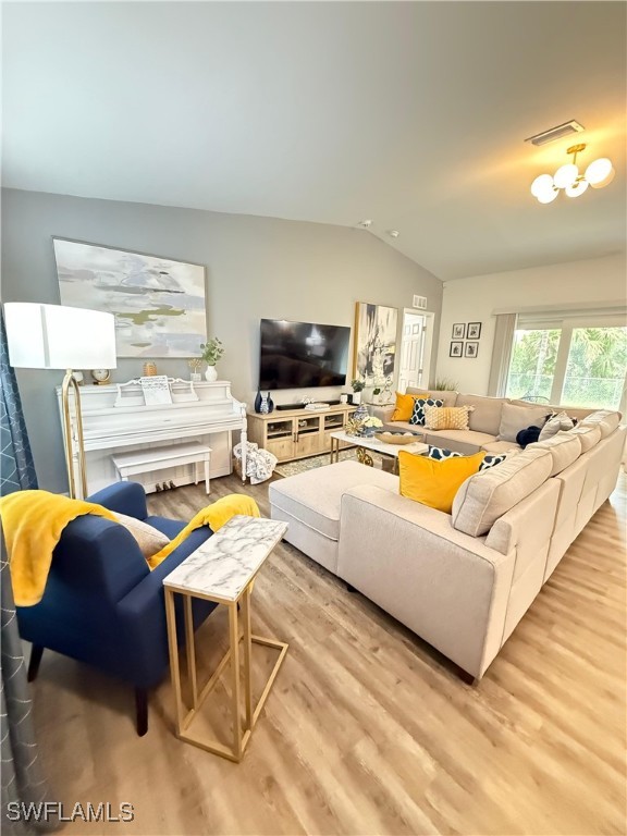 3006 Base Court LaBelle, FL 33935 - Photo 4 of 19 a living room with furniture and a flat screen tv