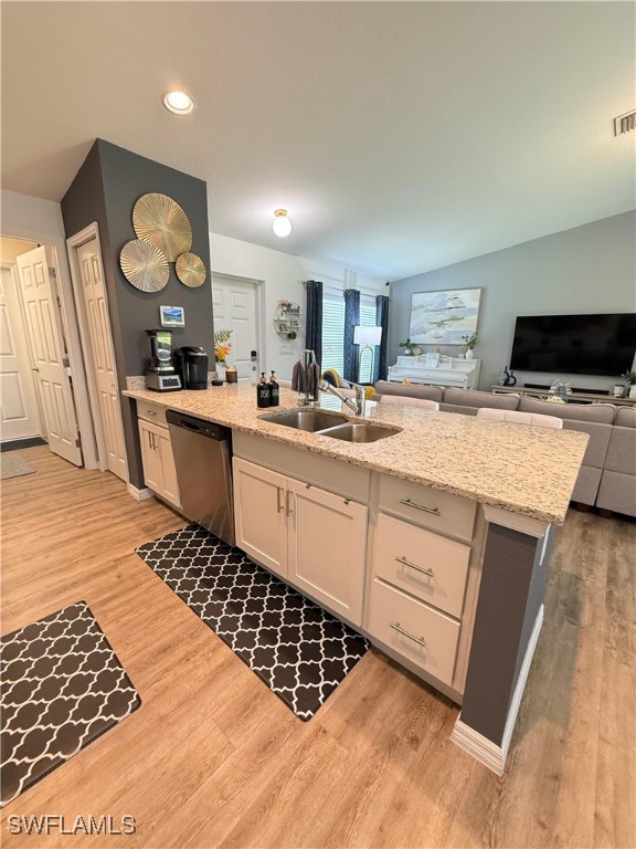 3006 Base Court LaBelle, FL 33935 - Photo 9 of 19 a kitchen with a sink and cabinets