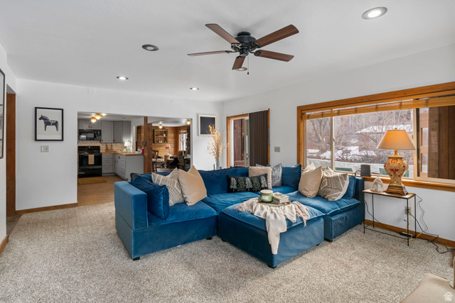 2189 Samak Park Loop, Unit 43 Kamas, UT 84036 - Photo 9 of 48 Living area featuring a ceiling fan, recessed lighting, and carpet flooring