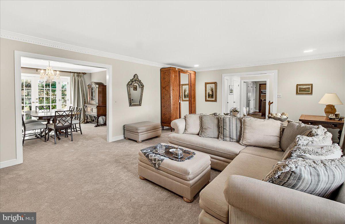 6400 Griffith Road Gaithersburg, MD 20882 - Photo 18 of 70 a living room with furniture and a large window