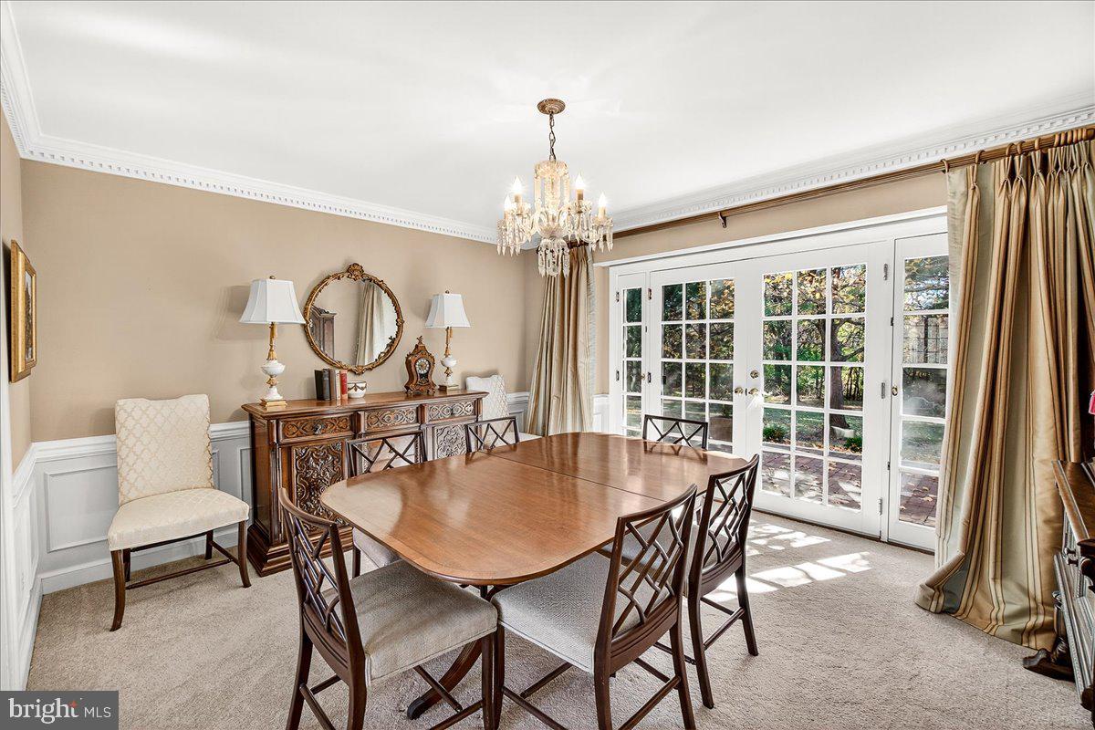 6400 Griffith Road Gaithersburg, MD 20882 - Photo 19 of 70 a view of a dining room with furniture window and outside view