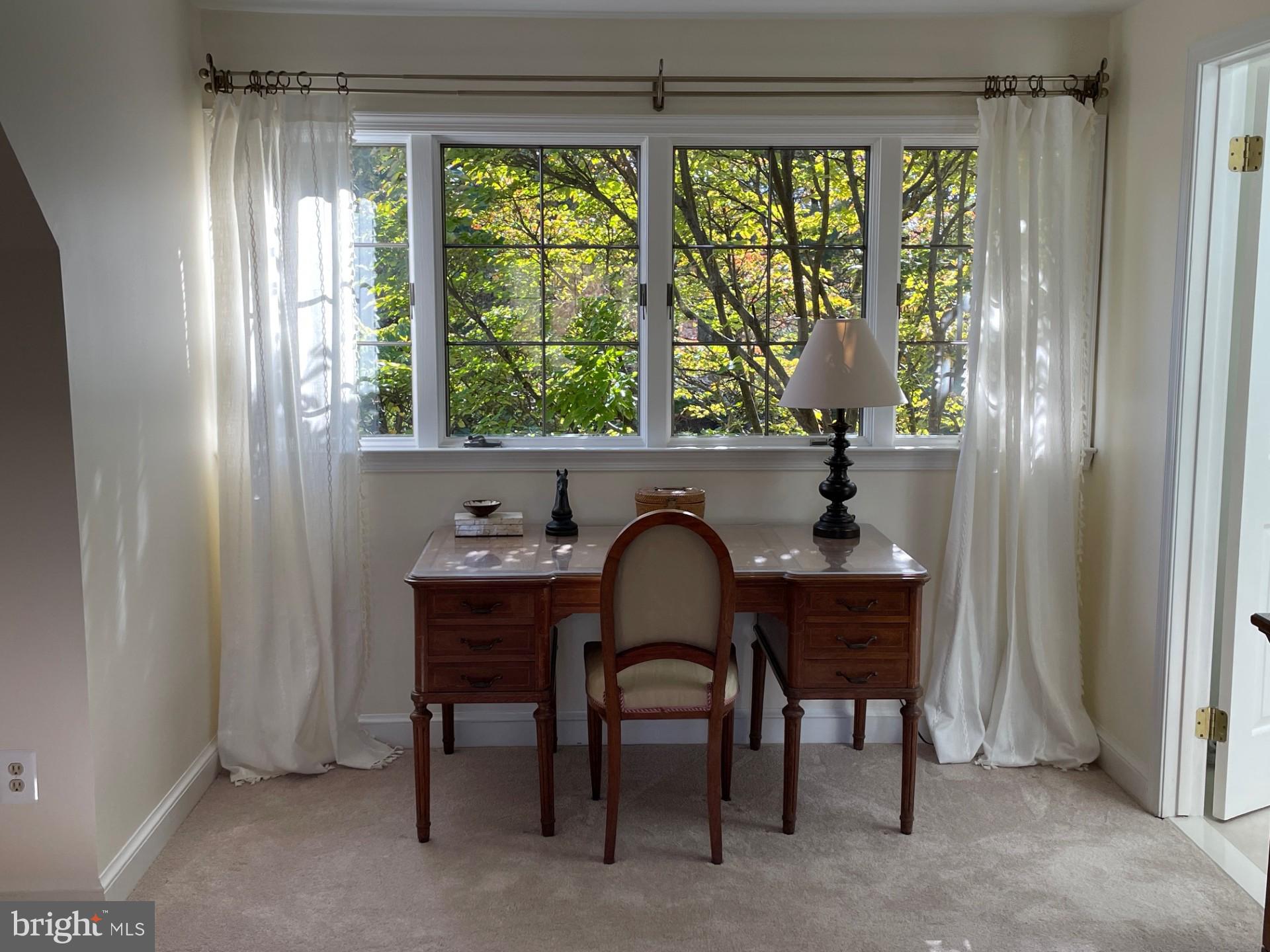 6400 Griffith Road Gaithersburg, MD 20882 - Photo 39 of 70 a room with a table and a window