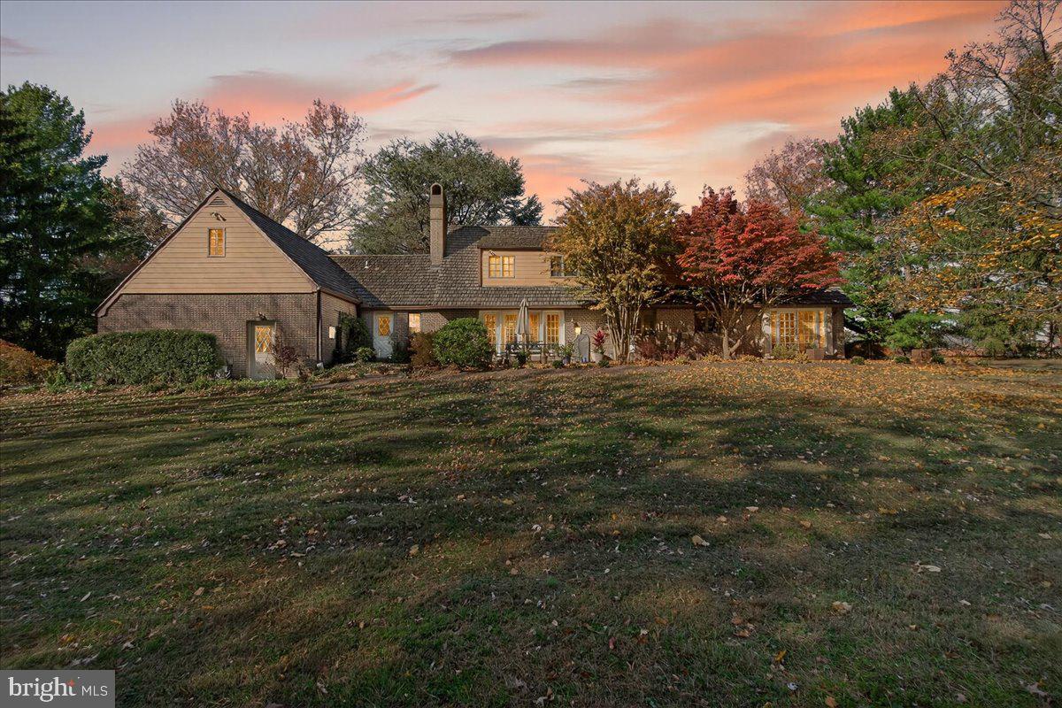 6400 Griffith Road Gaithersburg, MD 20882 - Photo 56 of 70 a front view of a house with a garden