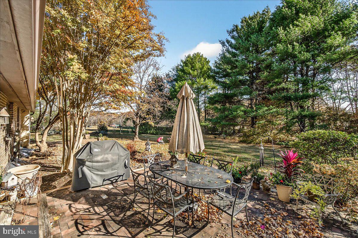 6400 Griffith Road Gaithersburg, MD 20882 - Photo 59 of 70 a view of a chairs and table in backyard