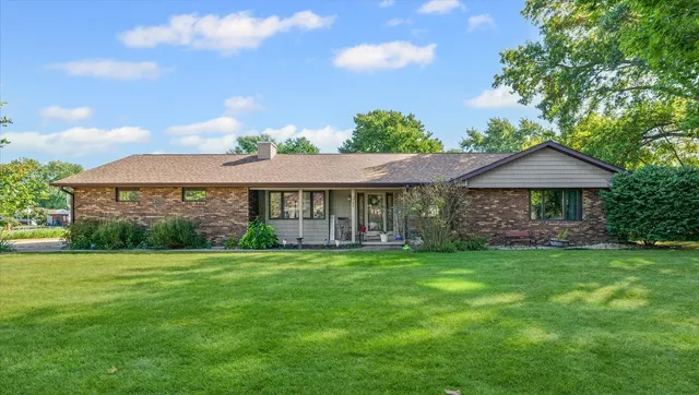 a view of a house with a garden