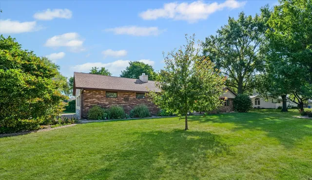 a view of a backyard with a garden