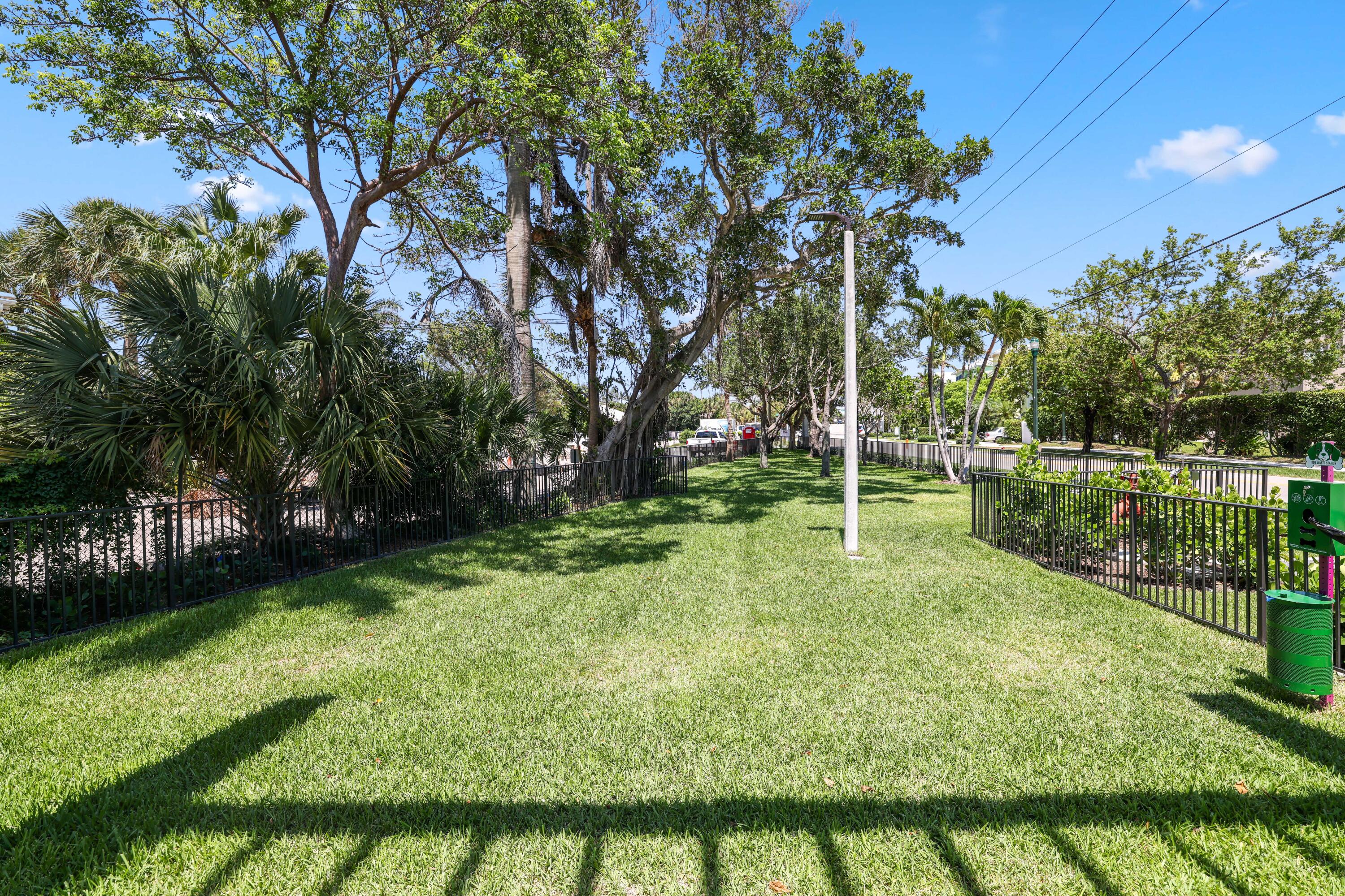 1177 George Bush Boulevard, Unit 306 Delray Beach, FL 33483 - Photo 60 of 66 a view of a park with large trees